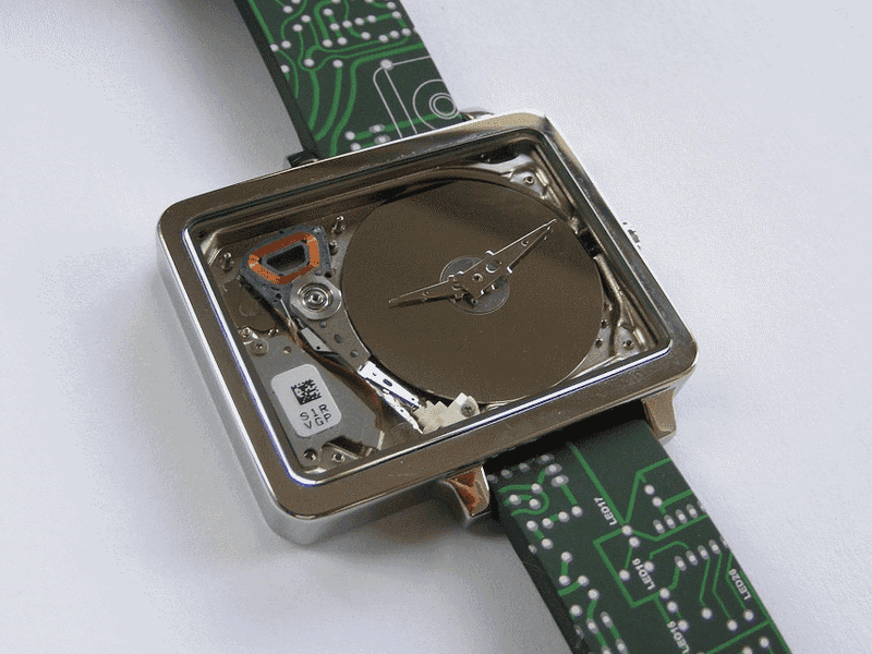 Illustration for article titled A Tiny Old Hard Drive Makes a Sweet Nerdy Watch